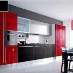 Even in the kitchen, red is present as a companion but not the main one