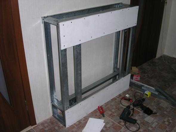 A false fireplace for an apartment is easier to make from plasterboard