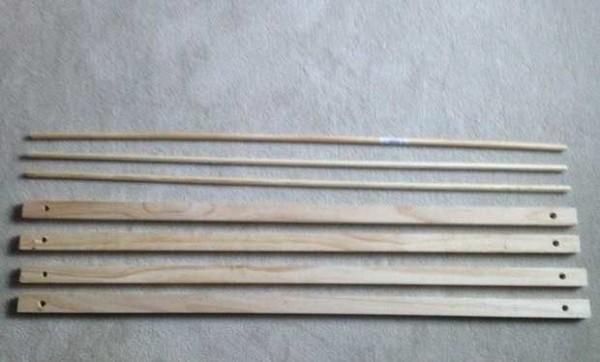 Four boards and three rods 