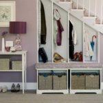 An under staircase closet is a great solution in a small hallway