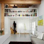 Shelves camouflage the sleeping space upstairs