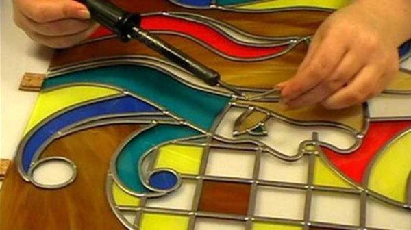 Film stained glass is the easiest to make on your own. but not too durable