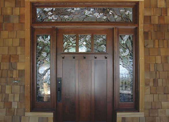 This design of the entrance group to a private house, could be called traditional... but stained glass makes it unusual and memorable