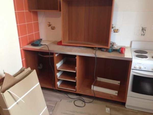 Start assembling kitchen furniture 