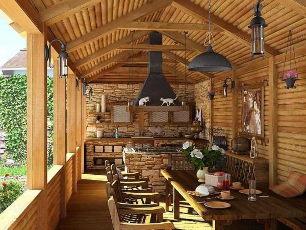 Outdoor summer kitchen made of timber, attached to the house