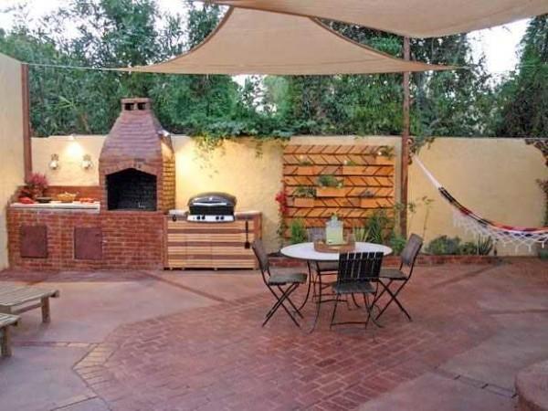 The area for the summer kitchen can be paved with paving tiles