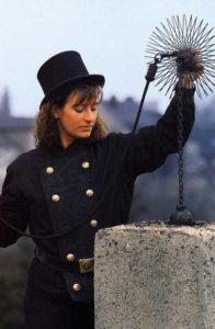 Chimney cleaning with a chimney sweep