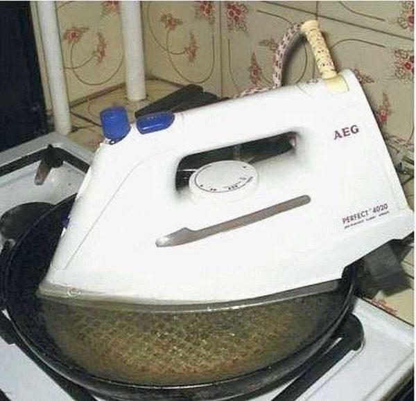 Cleaning the steam outlets on the iron