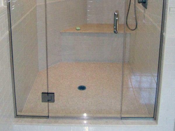 Glass doors and partition for a homemade shower cubicle 