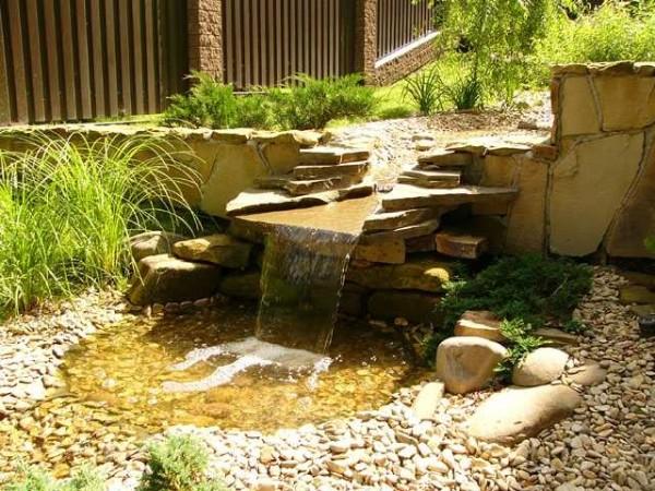 waterfall in the garden with his own hands photo