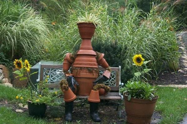 A man made of flower pots