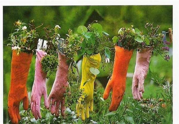 Hanging flowerbeds made from gloves