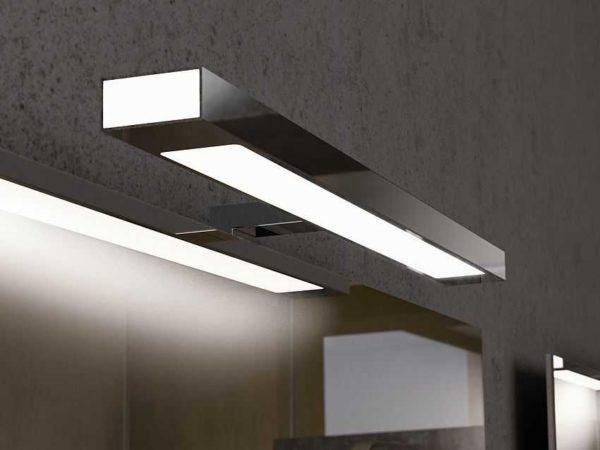 The light source can be positioned above the mirror