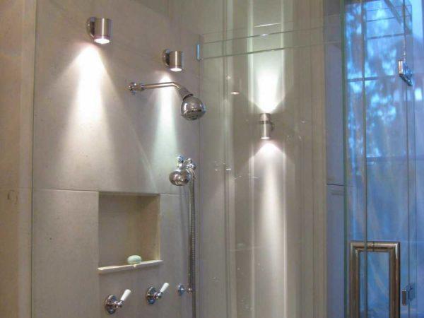 Bathroom luminaires with the ability to change the direction of light flow