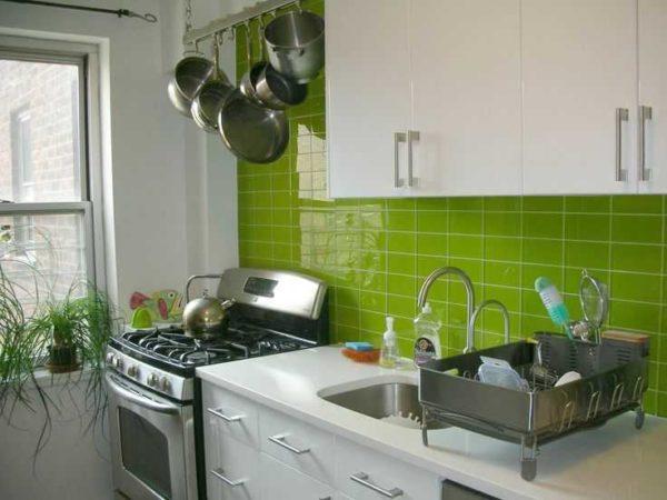 Brightly colored tiles on kitchen plastic - accentuate it