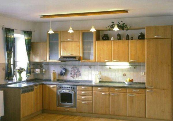 Install a long light fixture in a narrow kitchen