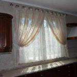 Double openwork curtains in different colors