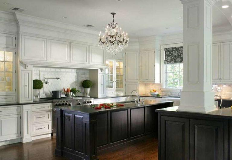 Kitchen with white wall and black osroff centerpiece