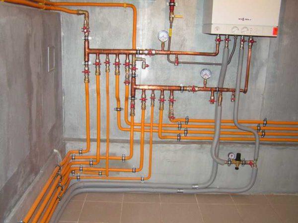 Example of boiler piping - copper first, then polymer pipes