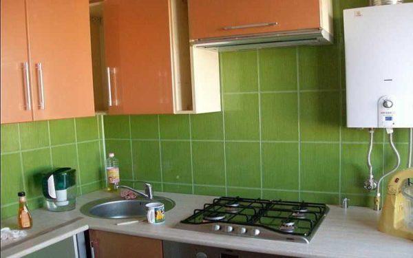 You can decorate the working wall in the kitchen with ceramic tiles