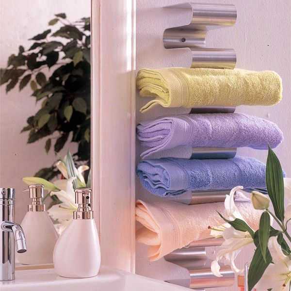 And another unconventional approach: an interestingly shaped towel shelf 