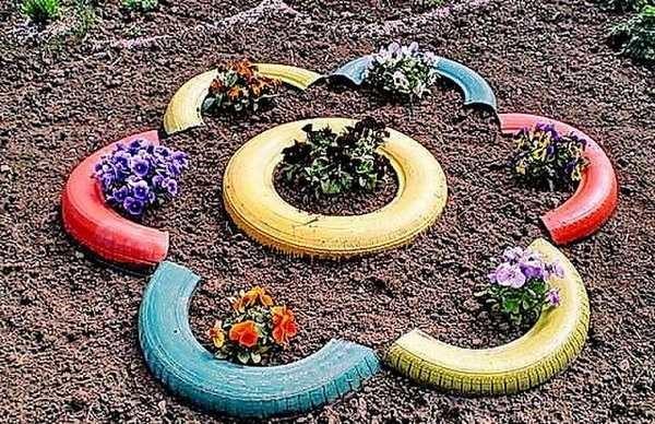 A flower bed made of car tires