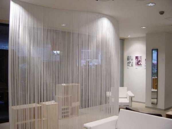 A waterfall of threads creates a translucent veil