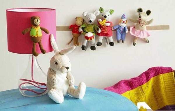 Velcro is one easy way to find a place for soft toys