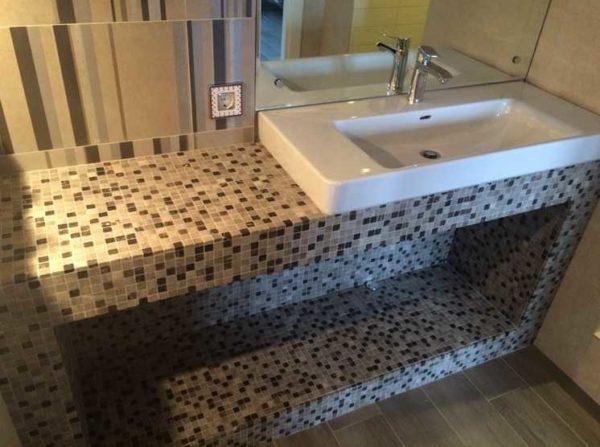 Plasterboard and mosaic can be used to make the most original shapes