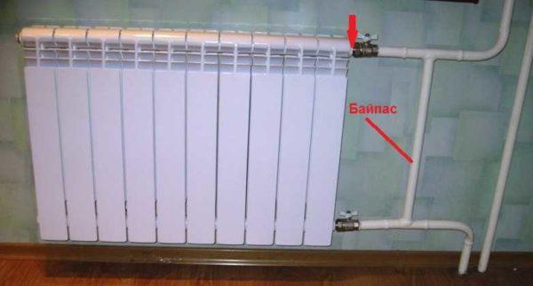 If you have similar wiring (there may not be a pipe on the right), a bypass is mandatory. The thermostat should be placed right behind the radiator