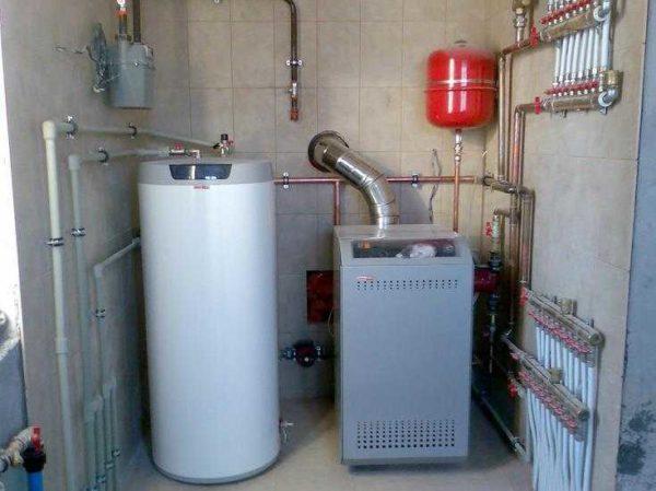 Floor standing gas boiler and storage boiler close by