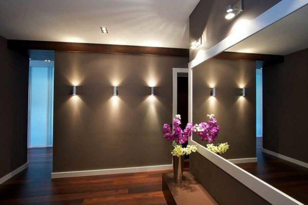 On the wall in the hallway wall sconces hang usually at a distance of 180-190 cm from the floor